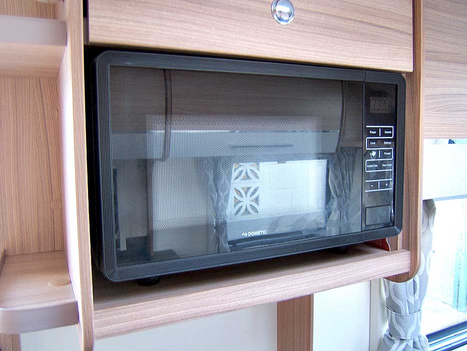 The Dometic Microwave Oven provides extra cooking options.